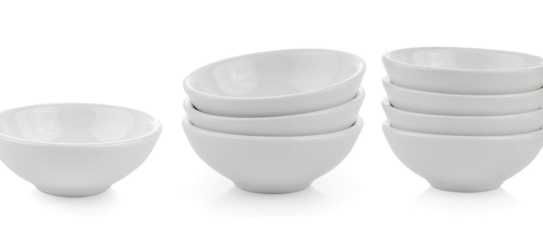 white bowls. one bowl by itself and the other bowls are stacked on top of one another. 